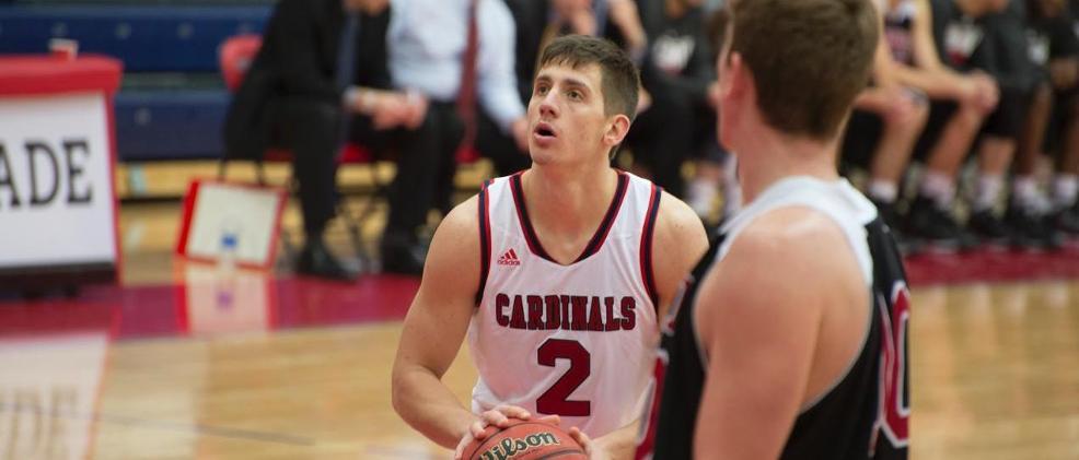 Junior Mitch Baenziger hit a three-pointer at the buzzer to give the Cardinals a 69-66 win