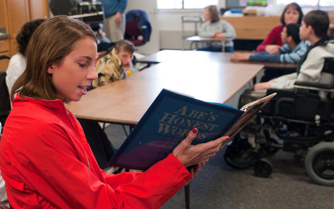 SVSU Track & Field Reads to Students at Bay-Arenac ISD Living and Learning Center