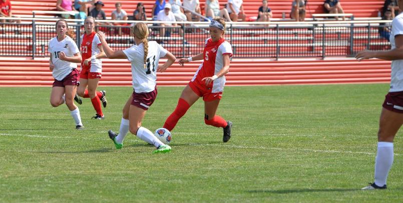 Ashley Henderson had two second half goals to lead the Cardinals to a victory over the Greyhounds...